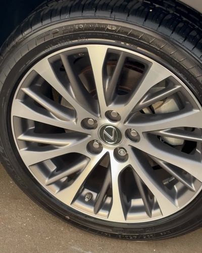 Clean Lexus alloy wheel with freshly dressed tire